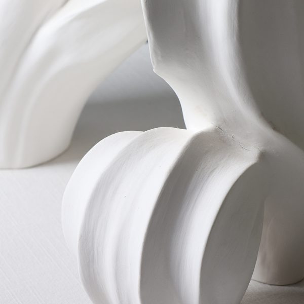 modern abstract ceramic sculptures elegant decorative art for home and office, artistic minimalist design, handcrafted white ceramic sculptures for living room, dining room, or office decor